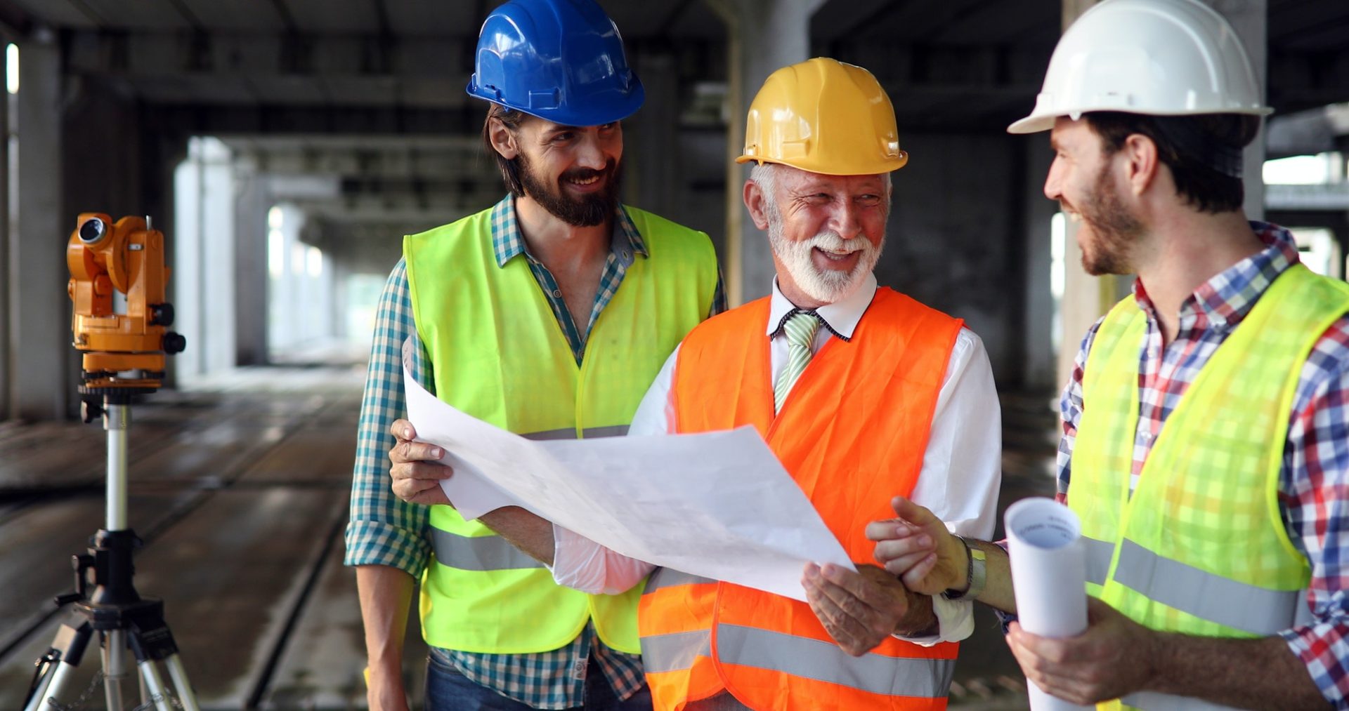 architect-and-construction-engineer-or-surveyor-discussion-plans-and-blueprints-e1600417294859