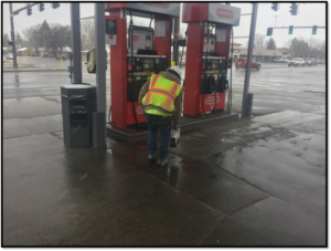 Horizontal injection well installation beneath active gasoline dispenser islands